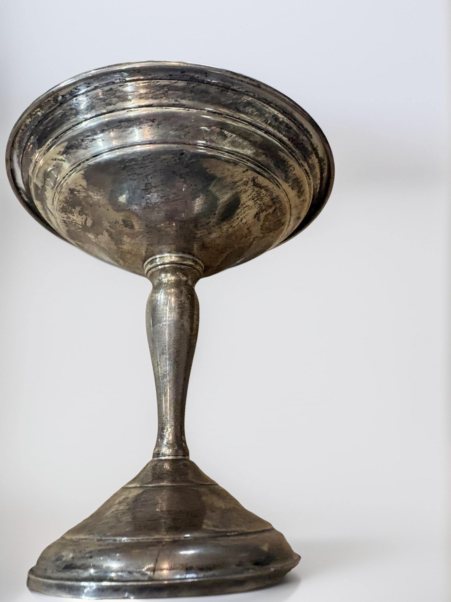 Revere Silversmiths Inc. Sterling Reinforced Compote Dish: This elegant pedestal compote dish, crafted by Revere Silversmiths Inc., features a classic minimalist design suitable for table service or decorative display. The piece is constructed of sterling