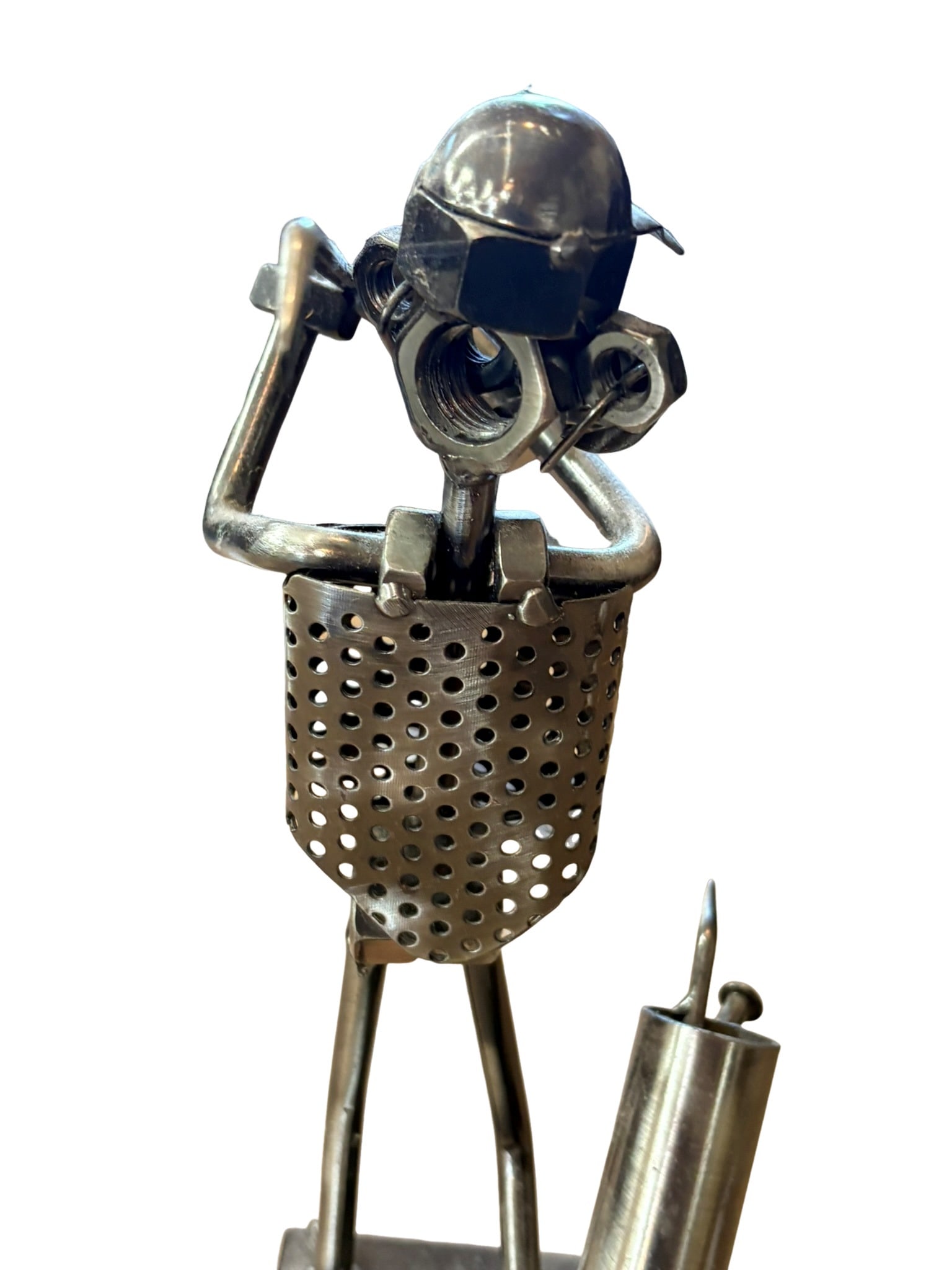 Industrial Scrap Metal Sculpture of a Golf Player: This whimsical folk art sculpture depicts a golfer in mid-swing, constructed entirely from repurposed industrial hardware, including nuts, bolts, washers, and perforated metal sheeting. The figure