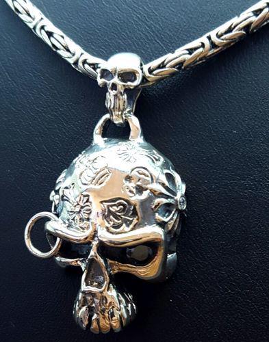 60Cm / 24in 925 Italian Sterling Silver chain with: 925 Italian Sterling Silver chain with Skull Pendant,Skull Eye Ornated with Black Zircon stone, Condition:New Chain:60cm Pendant Size:45mmx20mm Weight:48,50 g Gender