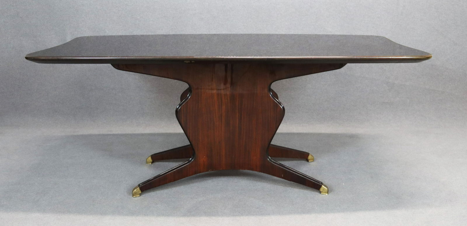 OSVALDO BORSANI. Dining table with glass top and brass (1 of 3)