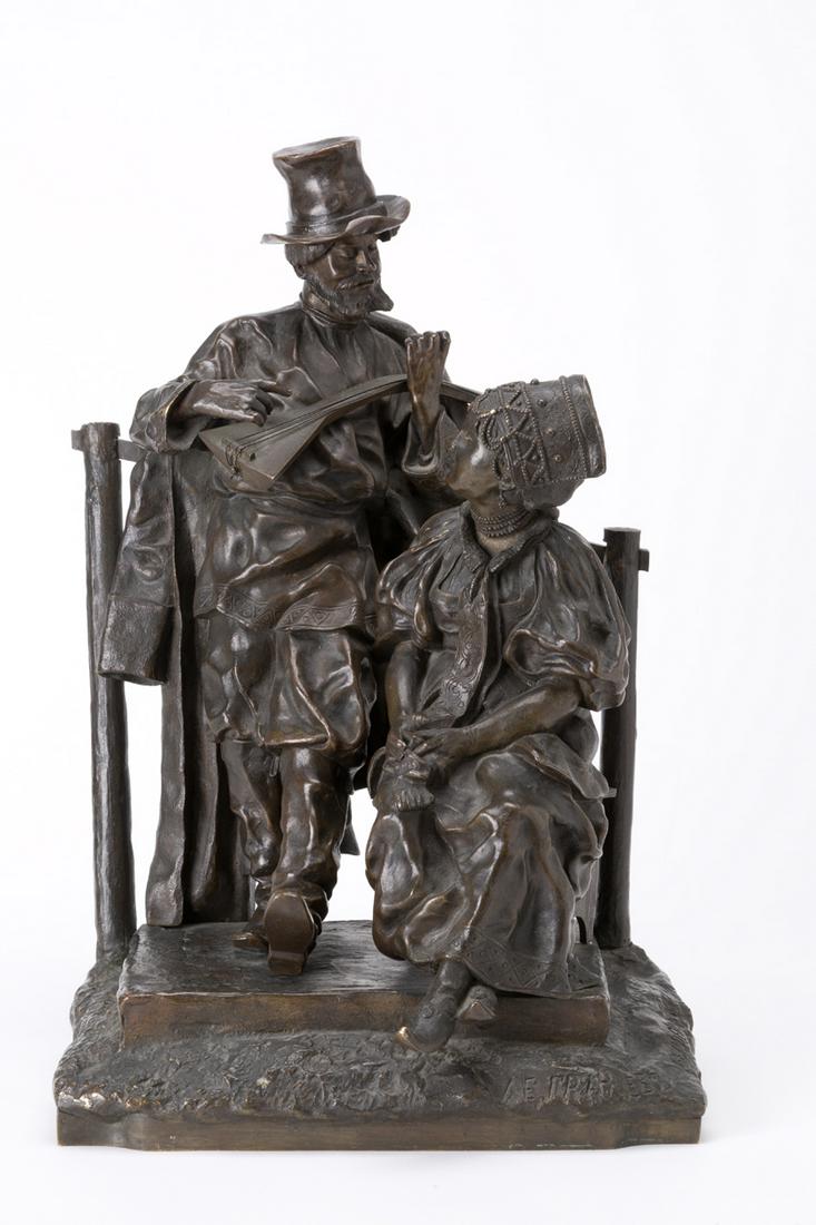 VASSILY YACOVLEVITCH GRACHEV. Bronze sculpture: VASSILY YACOVLEVITCH GRACHEV (Russia, 1831-1905). Scultura in bronzo patinato raff. ''SERENATA CON BALALAIKA''. Firmata sull'angolo destro. Mis. Lung. cm. 20 Alt. cm. 32 Prof. cm. 14 ca. Val. 3000/500