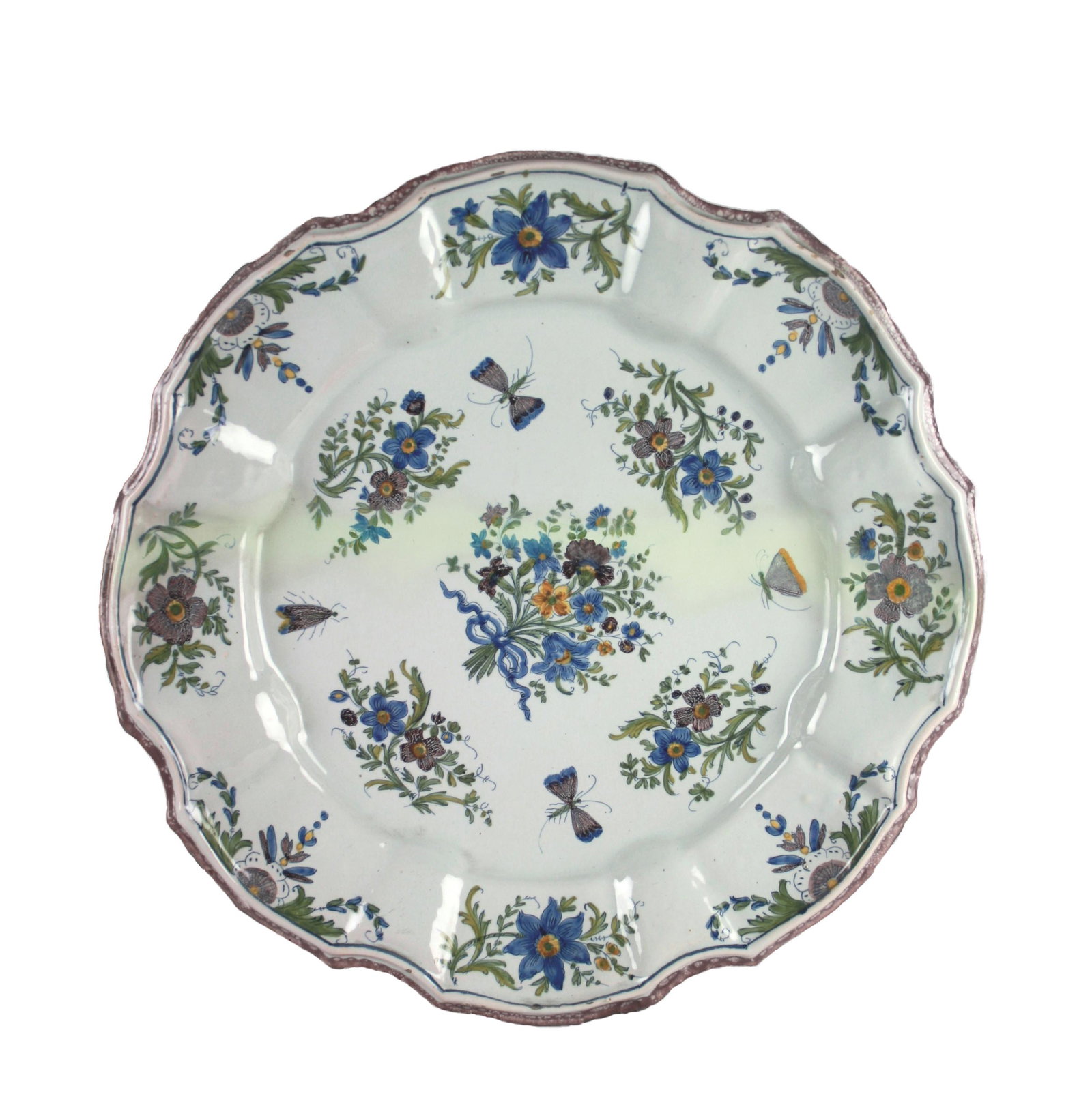 Polychrome ceramic plate. Bassano. 18th c.: Piatto in ceramica policroma con bordo polilobato e decoro floreale. Bassano. XVIII secolo. Restauri. Mis. Diam. cm. 42 ca. Val. 250/350