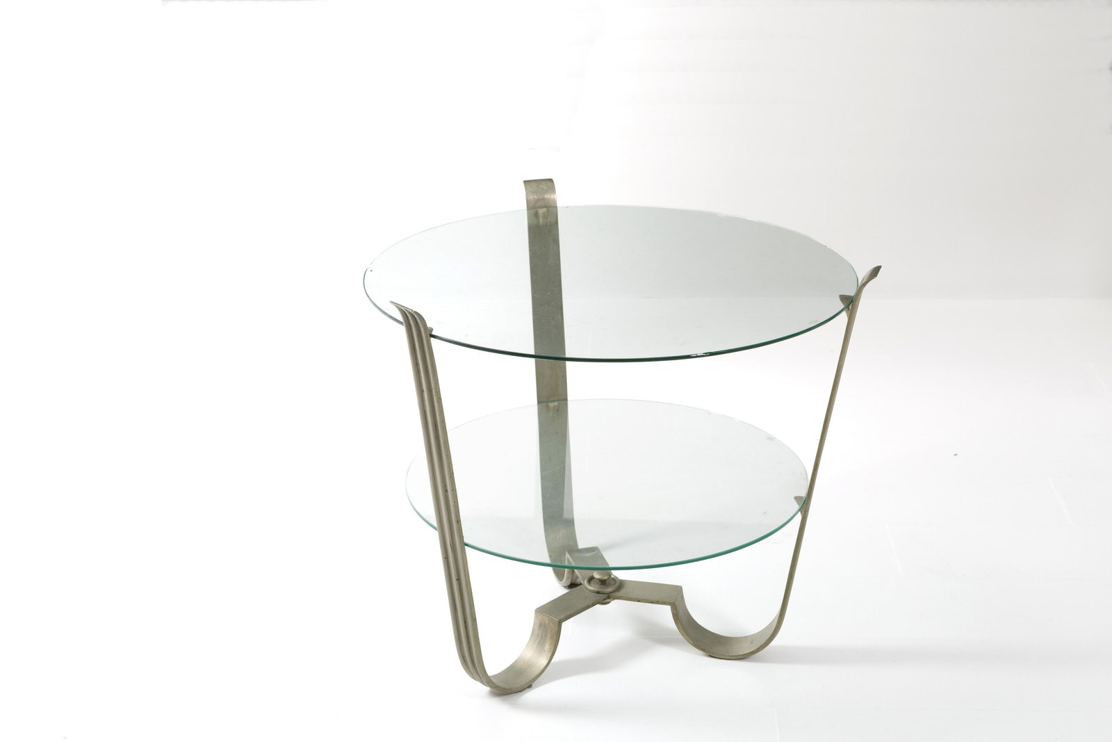 ALESSANDRO TIBALDI for CASSANI. Metal coffe table: ALESSANDRO TIBALDI per CASSANI. Tavolino in metallo nichelato con due ripiani tondi in vetro. Realizzato su commissione per casa P.A. Milano. 1933. Pubblicato su Domus n. 64, aprile 1933, p. 219. Liev