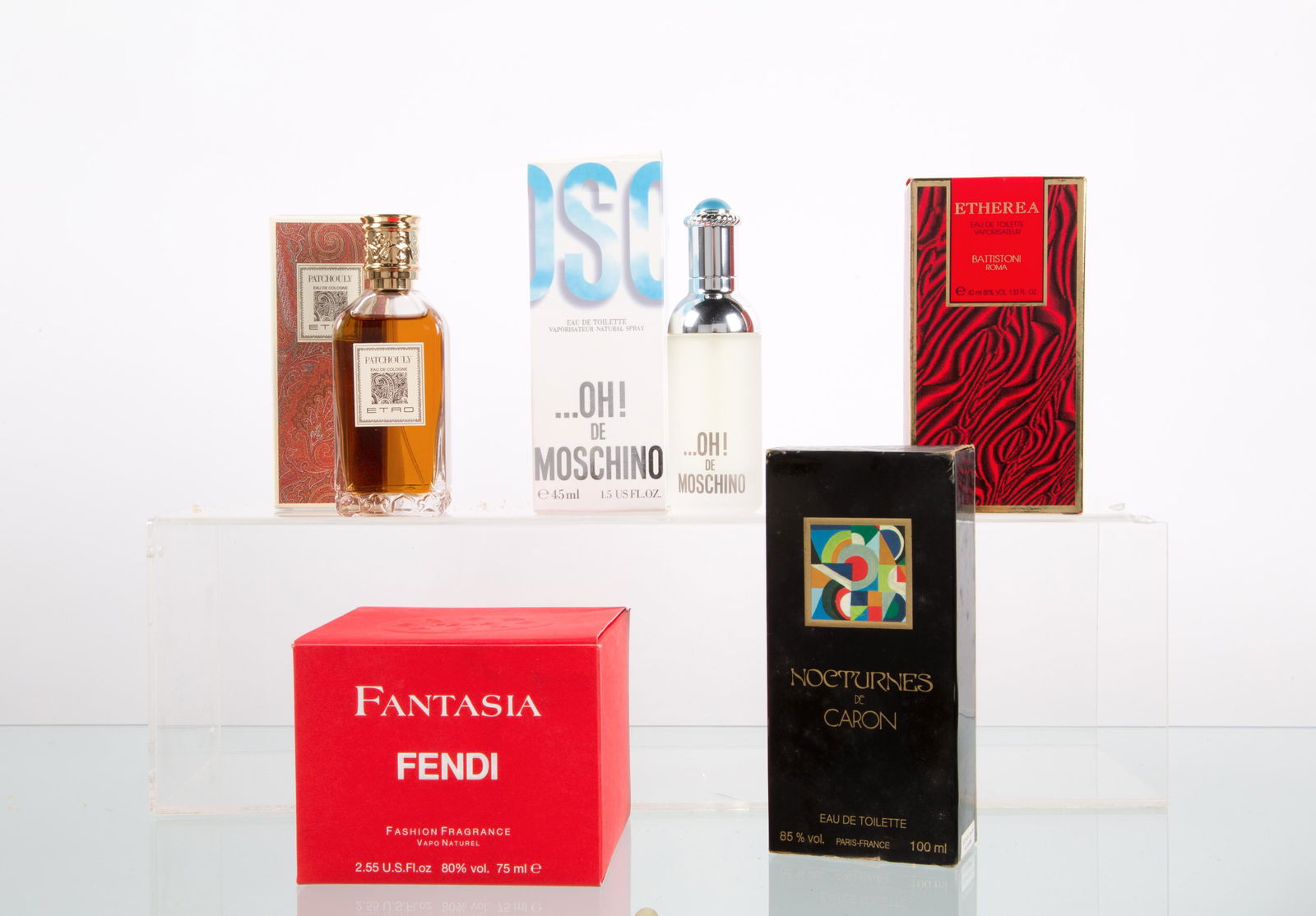Five vintage perfumes: Lotto composto da cinque profumi mai usati - ...OH! De Moschino Eau de Toilette spray di MOSCHINO. 45 ml - Patchouly Eau de Cologne di ETRO. 100 ml - Fantasia Fashion Fragrance spray di FENDI. 75 ml -