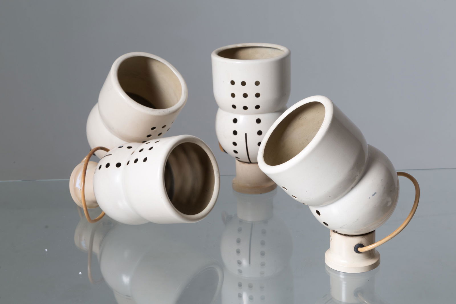 Four metal sconces. MARTINELLI LUCE. 60-70s (1 of 2)