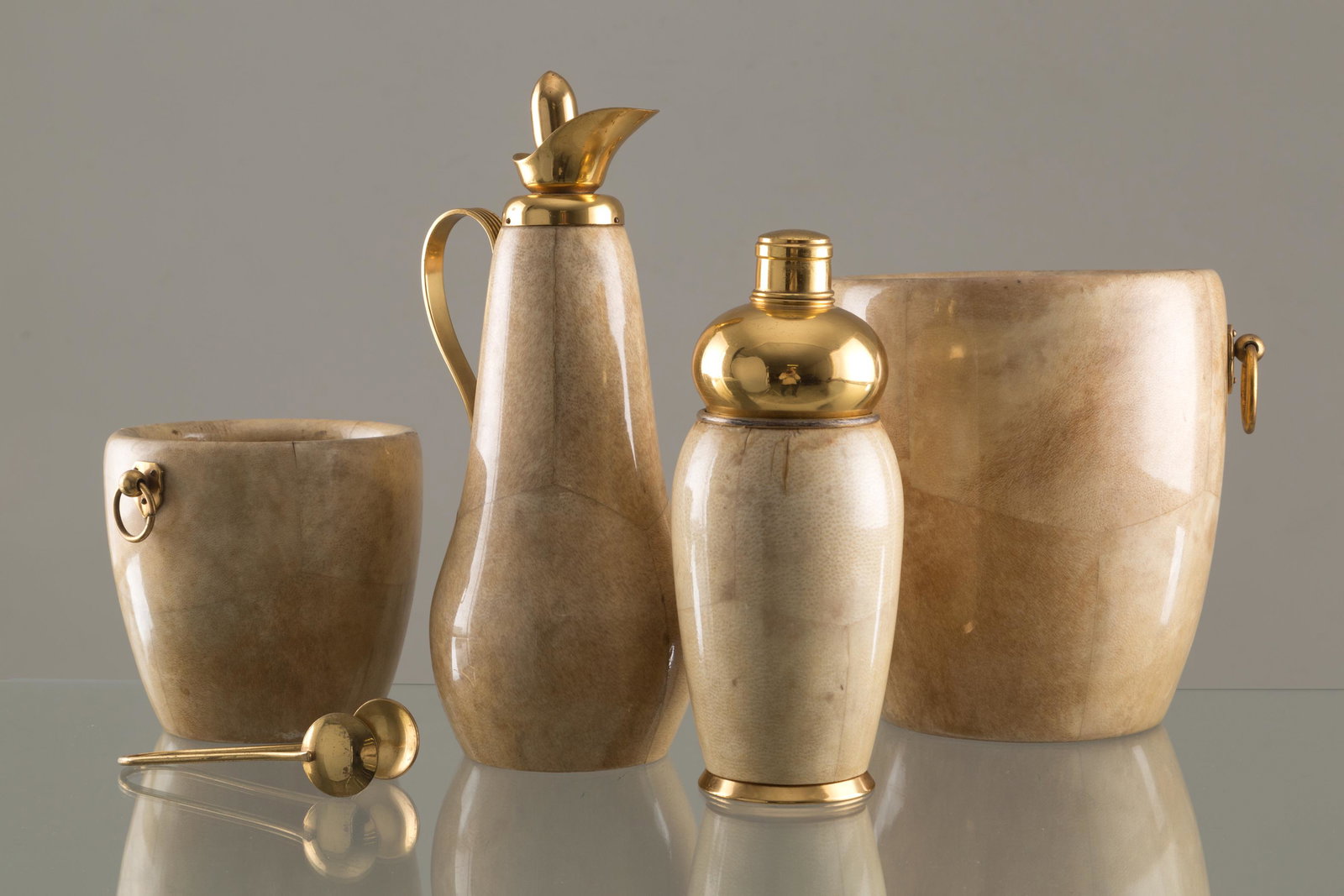 ALDO TURA for MACABO. Set in parchment and brass. (1 of 5)