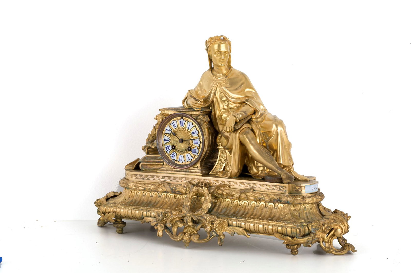 Table clock: Gilt bronze table clock depicting '' DANTE ''. Nineteenth century. 40x55x18 cm approx. Orologio da tavolo in bronzo dorato raffigurante ''DANTE''. XIX secolo. 40x55x18 cm ca.