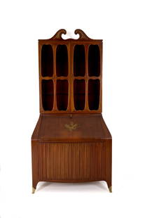 PAOLO BUFFA. Bureau-trumeau. Published: PAOLO BUFFA (Milano 1903-Milano 1970). Wooden bureau-trumeau with flap, two fluted doors at the base and two glass doors on the top with gilded brass applications. 1940s . Published in Roberto Rizzi,