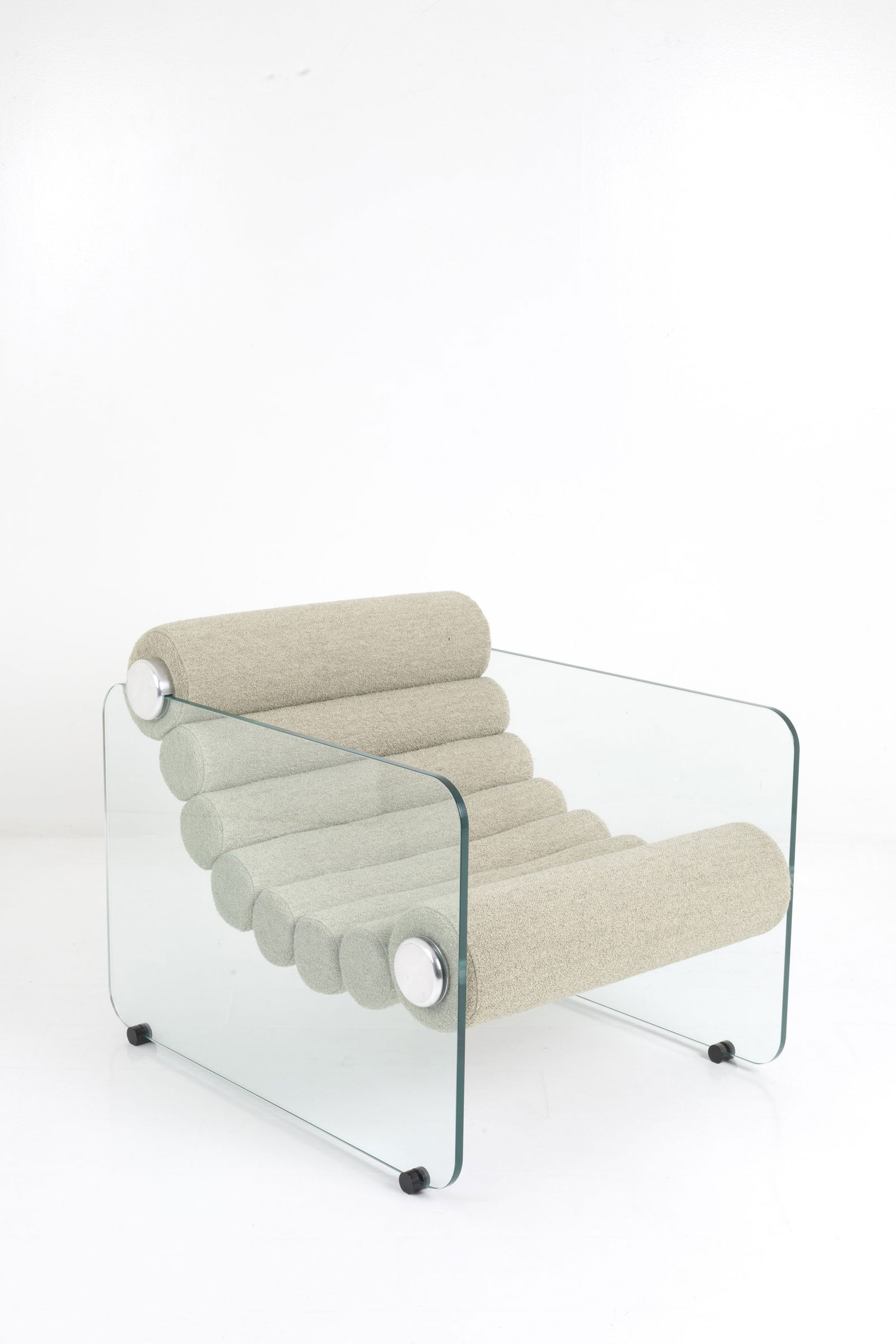 FABIO LENCI. Hyaline armchair for COMFORT LINE: FABIO LENCI (Roma 1935). Hyaline armchair in green boucle' fabric and structure in glass, steel and plastic material. COMFORT LINE production. Late 70s. Signs of wear over time. 73x75x90 cm approx. FA