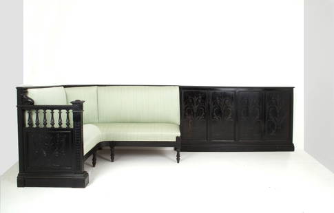 Corner sofa with boiserie: Corner sofa in ebonized wood carved with floral motifs with boiserie and padded silk seats. 20th century. Signs of wear over time.? 110x370.5x153 cm approx. Divano angolare in legno ebanizzato