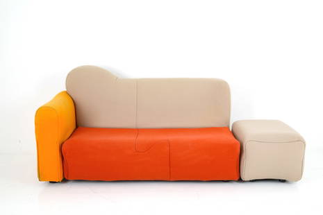 GAETANO PESCE. Cannaregio sofa for CASSINA: GAETANO PESCE (La Spezia 1939). Cannaregio modular sofa with pouffe in wood, expanded polyurethane and beige, orange and ocher fabric. CASSINA production. Manufacturer's label inside. 1987. Signs of w