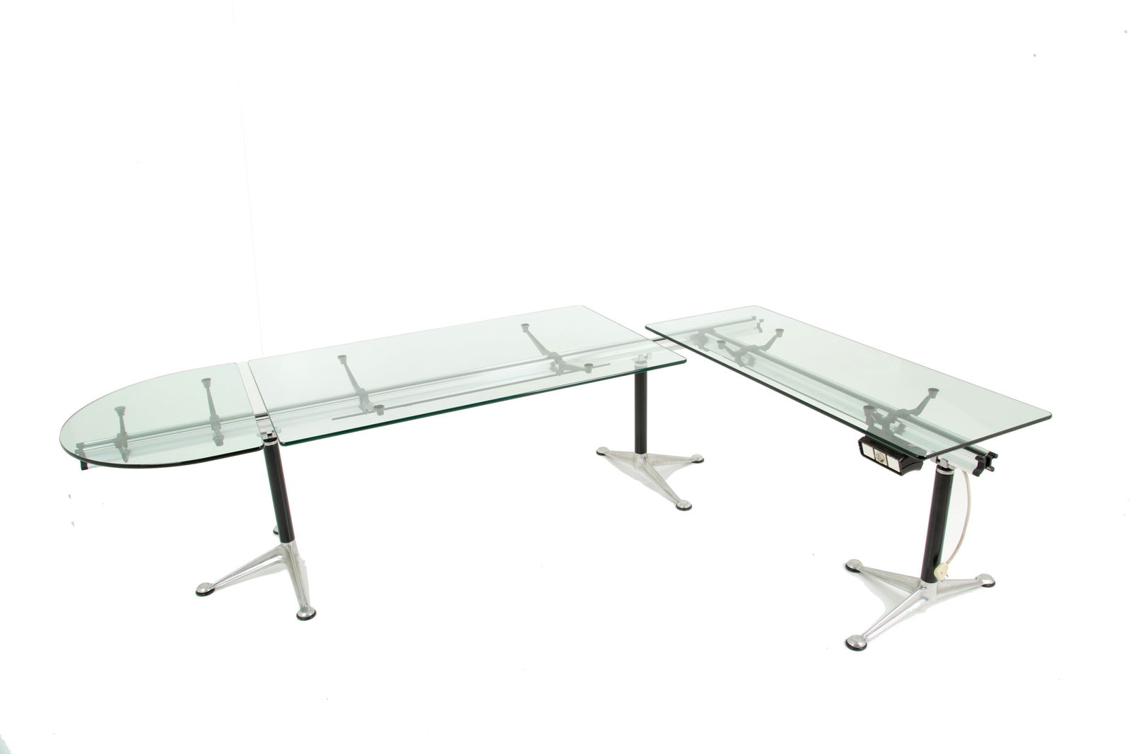 BRUCE BURDICK (attr.). Desk for HERMAN MILLER (Attr.): BRUCE BURDICK (attr.)(Las Vegas 1933-2021). Large desk in lacquered metal, aluminum, MDF and resin with three glass shelves and under-counter electrical outlets. Manufactured by HERMAN MILLER (Attr.).