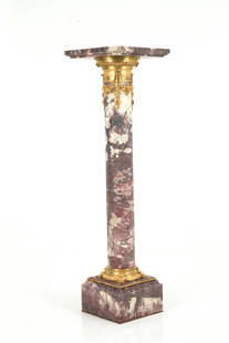 Marble and bronze column: Peach blossom marble column with finely chiseled and gilded bronze finishes. 19th century. 107.5x30x30 cm approx. Colonna in marmo fior di pesco con finiture in bronzo finemente cesellato e dorato. XI