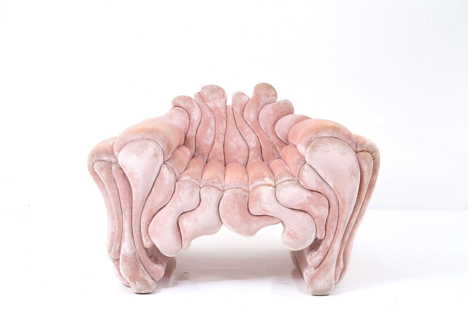 ROBERTO FALLANI. Lavica armchair for FORMITALIA: ROBERTO FALLANI (Firenze 1937). Lavica armchair in pink velvet. Production FORMITALIA. 1991. Published in Massimo Domenicucci and Flavio Mangione (edited by), Futuro Anteriore - Future Perfect, Floren