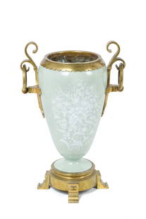 Celadon porcelain vase: Celadon porcelain vase decorated with white enamel and bronze trim. China. 19th century. Height approx. 37 cm. Vaso in porcellana celadon decorata in smalto bianco con finiture in bronzo. Cina. XIX se