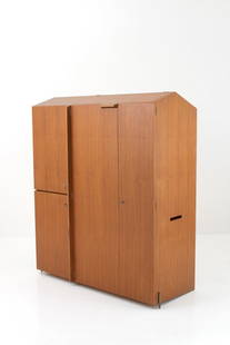 GIOVANNI OFFREDI. Wardrobe. With project drawings and a declaration of authenticity.: GIOVANNI OFFREDI (Milano 1927 - 2007). Three-door wooden wardrobe with a partial opening at the top, featuring a sloping roof, and two brass feet. 1963. Unique piece. Minor defects and signs of wear.