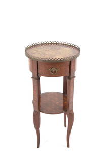 Circular center cabinet: Circular centerpiece cabinet in veneered wood with geometric and floral motifs, a drawer on the side, and gilded bronze fittings. Late 19th century. Defects. 70.5x35 cm approx. Mobiletto da centro cir