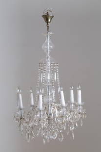 Cut glass chandelier: Eight-light cut glass chandelier with chains and geometric pendants. 19th century. Height approx. 90 cm. Lampadario in vetro molato otto fiamme con catenelle e pendenti geometrici. XIX secolo. Alt. 90