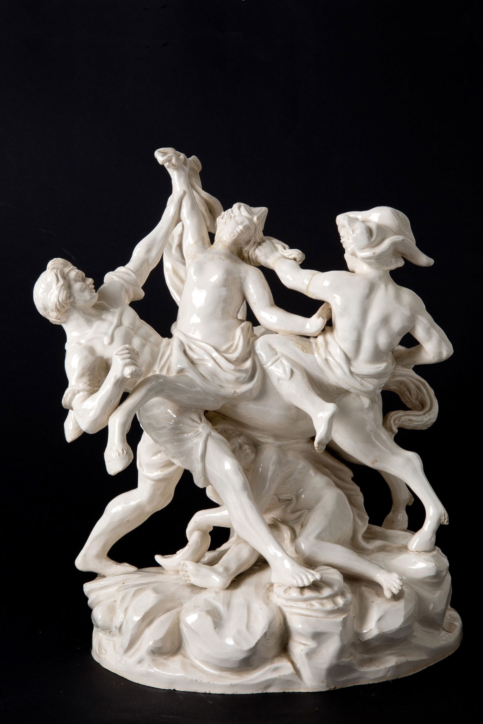 Majolica sculpture group. Capodimonte: Majolica sculpture depicting "BATTLE OF THE CENTAURS" Marked CAPODIMONTE on the bottom. 19th century. Defects and cracks. 33x35x24 cm approx. Gruppo plastico in maiolica raffigurante "CENTAUROMACHIA".