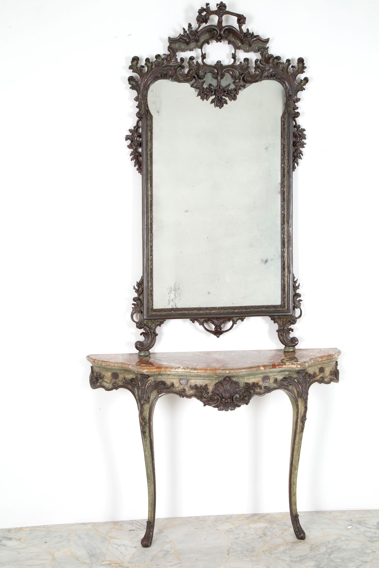 Console table with mirror: Carved and lacquered wooden console table with floral motifs, mirror and marble top. Late 19th century. Defects and missing parts. 240x120x36 cm approx. Consolle in legno intagliato e laccato a motivi