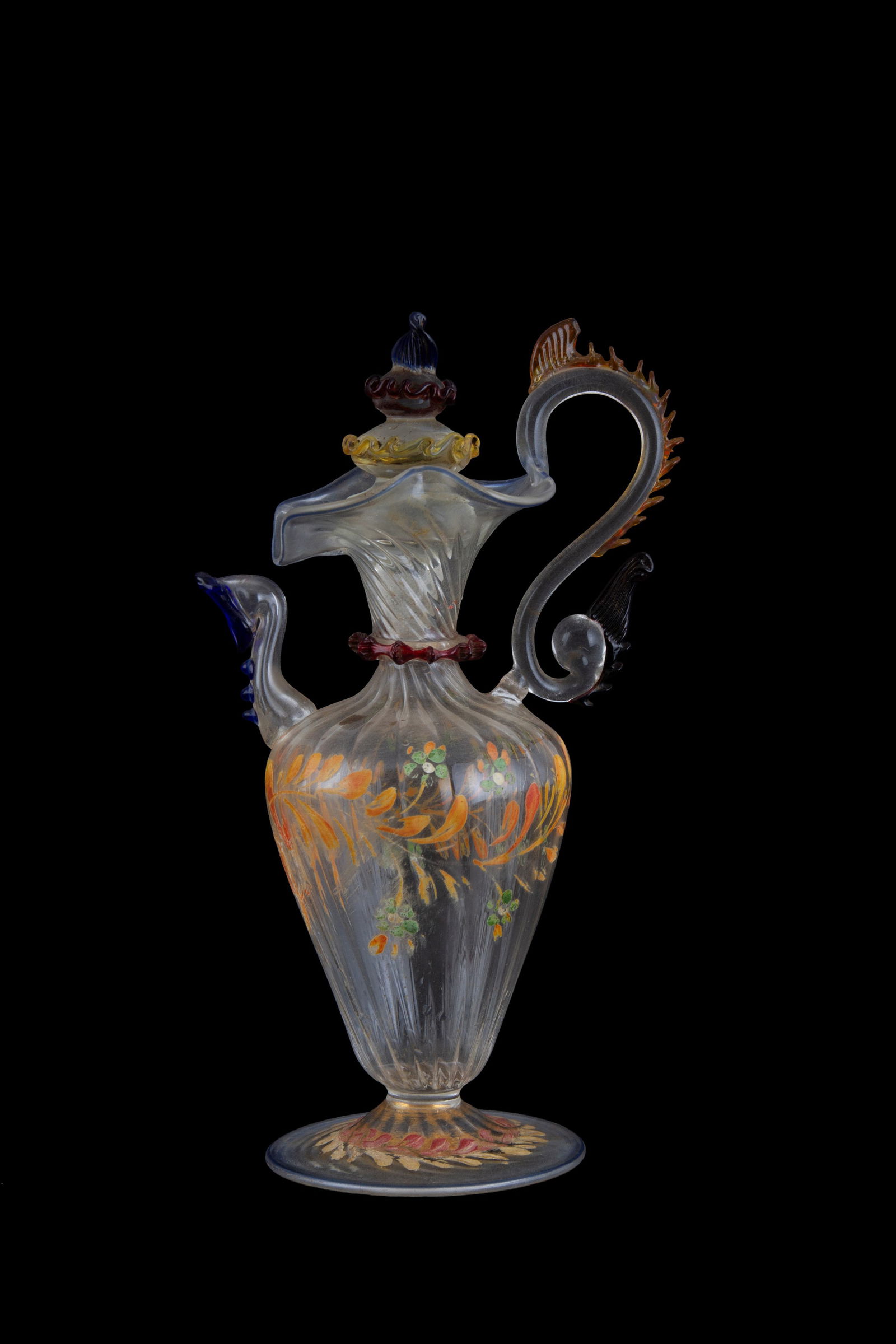 Glass jug: Blown and polychrome glass jug with painted floral motifs. 18th century. Height approx. 19 cm. Versatoio in vetro soffiato e policromo con decori dipinti a motivi floreali. XVIII secolo.? Alt. 19 cm c