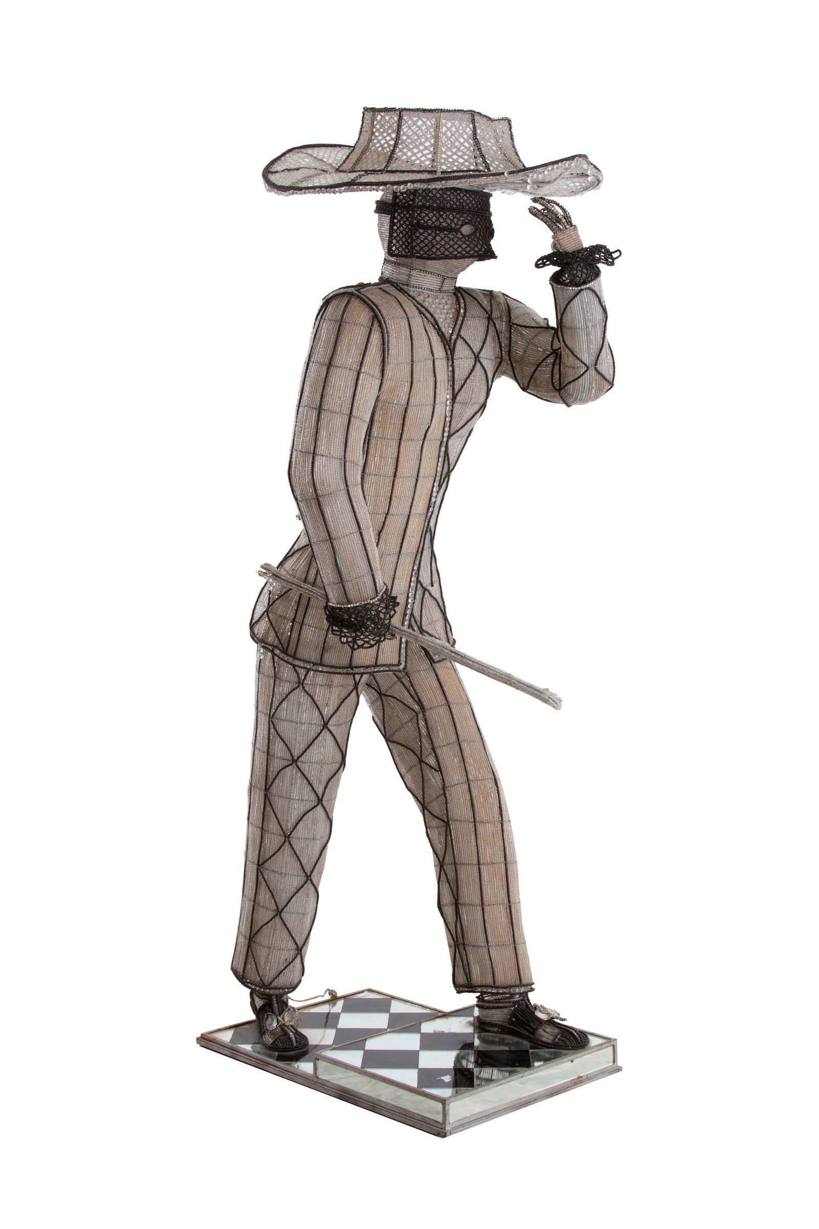 Floor lamp "MASKED MAN": Floor lamp with a metal frame covered in Murano glass beads depicting a "MASKED MAN" with decorative elements in cut glass. Chequered metal base, black glass, and mirror. Defects and signs of wear.