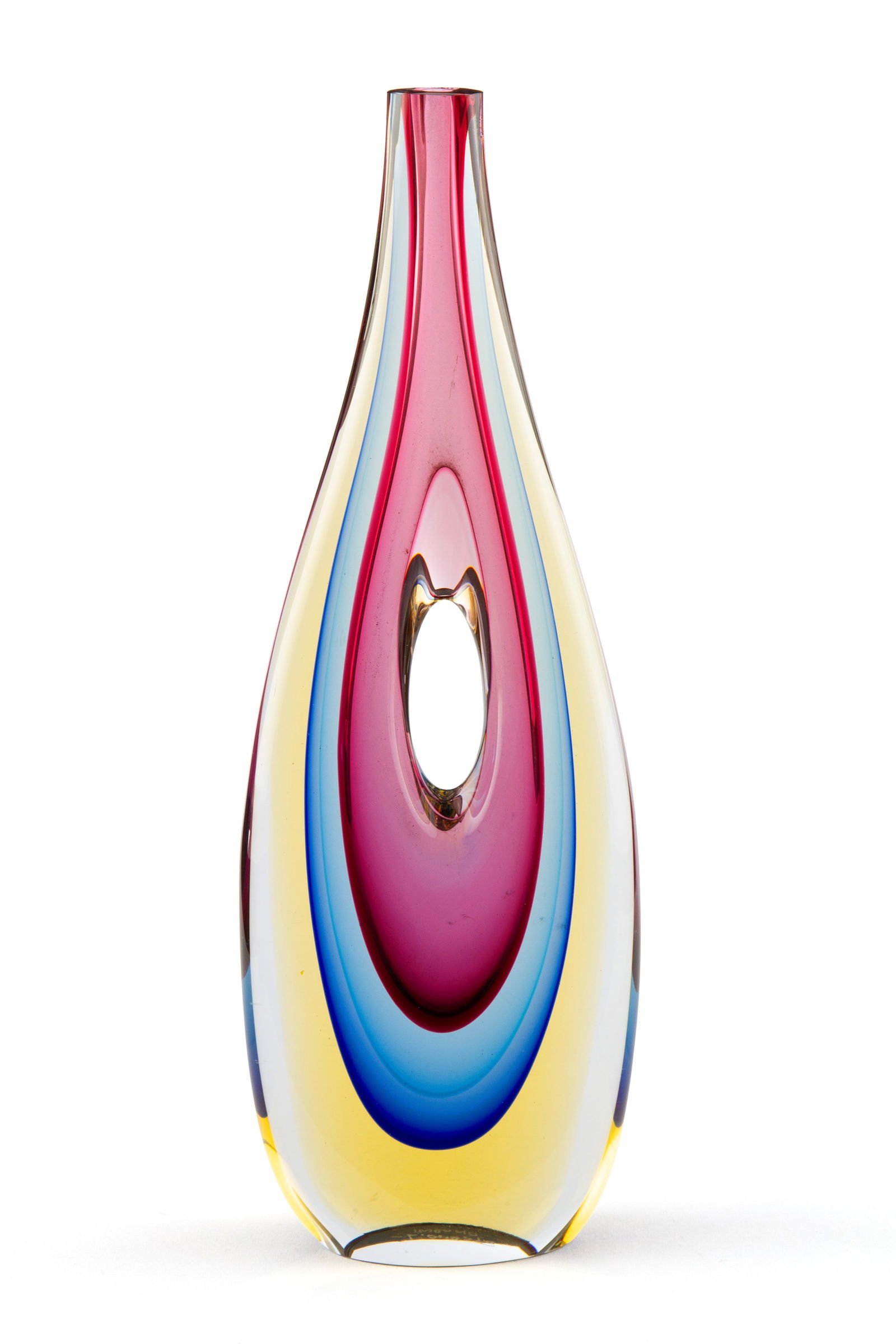 LUIGI ONESTO. Submerged glass vase: LUIGI ONESTO (Murano 1935). Submerged Murano glass vase in shades of yellow, blue, and fuchsia with a hole in the center. Signed on the bottom. 35x12x3.5 cm approx. LUIGI ONESTO (Murano 1935). Vaso