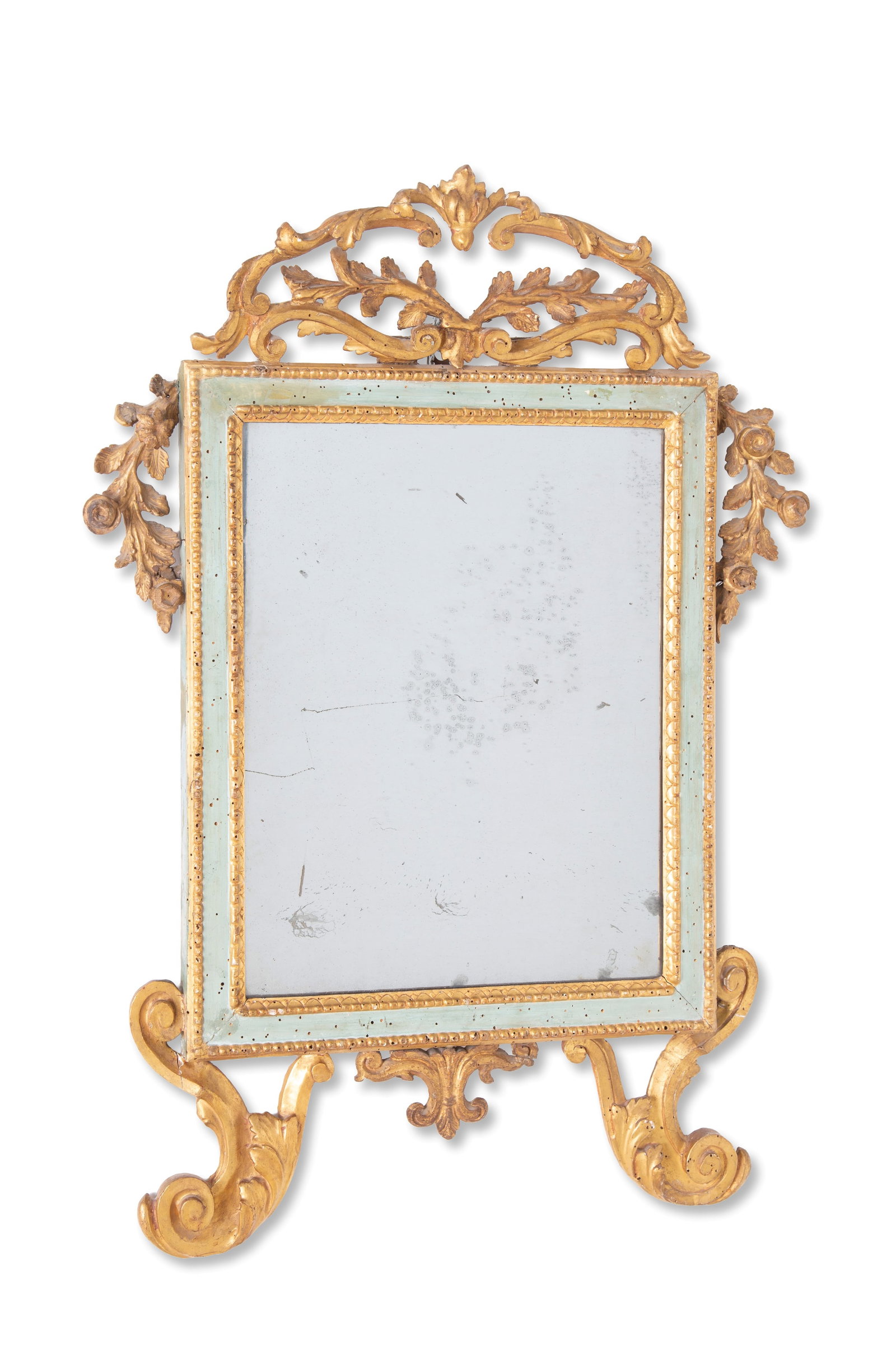 Specchiera laccata e dorata: Lacquered and gilded wood mirror with carved and perforated cornice. 18th century. Minor defects. 87x60 cm approx. Specchiera in legno laccato e dorato con cimasa intagliata e traforata. XVIII