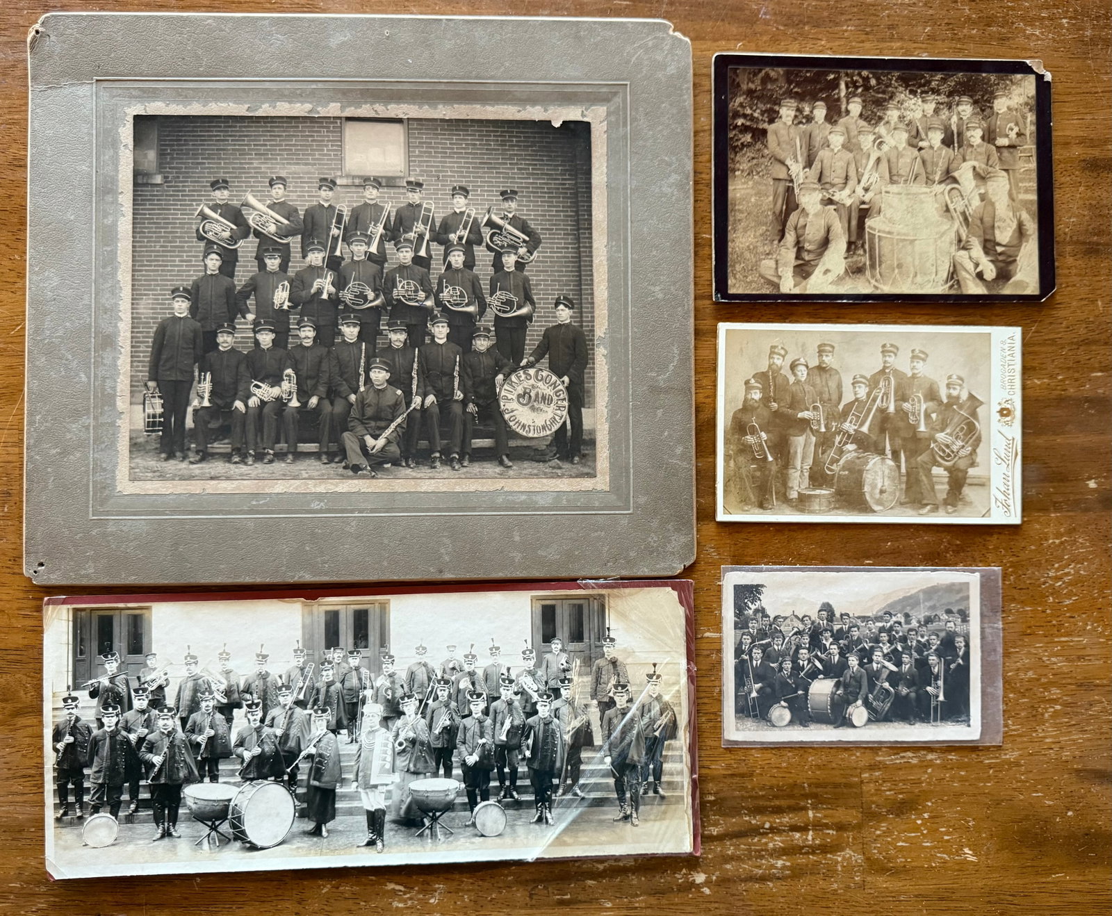 Lot of 5 Antique band photos. Civil war era band members. Late 1800's: Lot of 5 photographs of band members. Dated to late 1800's shows Pikes Gongert Johnston band along with other bands filled with young men. See Photos for best description , very unique pictures.