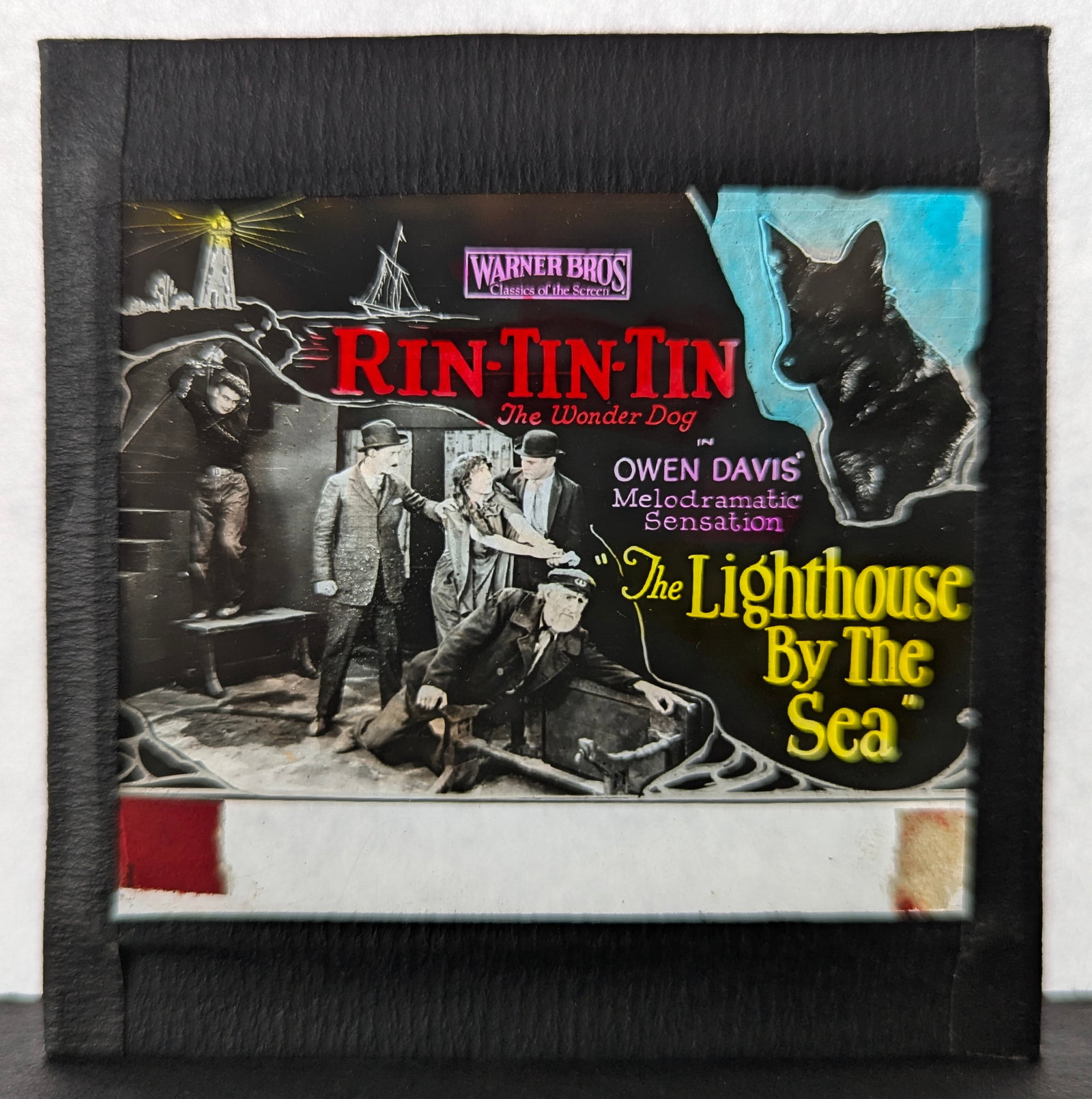 The Lighthouse by the Sea - Silent Film Magic Lantern Movie Slide: American silent adventure film produced by and distributed by Warner Bros. The film's star is canine sensation Rin Tin Tin, the most famous animal actor of the 1920s. The film was directed by Malcolm