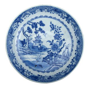 A BLUE AND WHITE 'FIGURES IN LANDSCAPE' DISH: D: 22.5cm