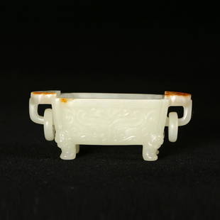 A WHITE JADE INCENSE BURNER WITH LOOPED HANDLES: L:7.3cm