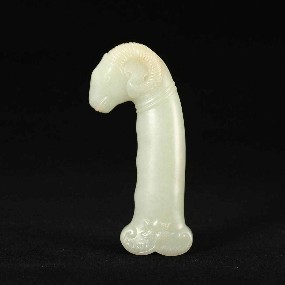 A WHITE JADE 'SHEEP' ORNAMENT (1 of 5)