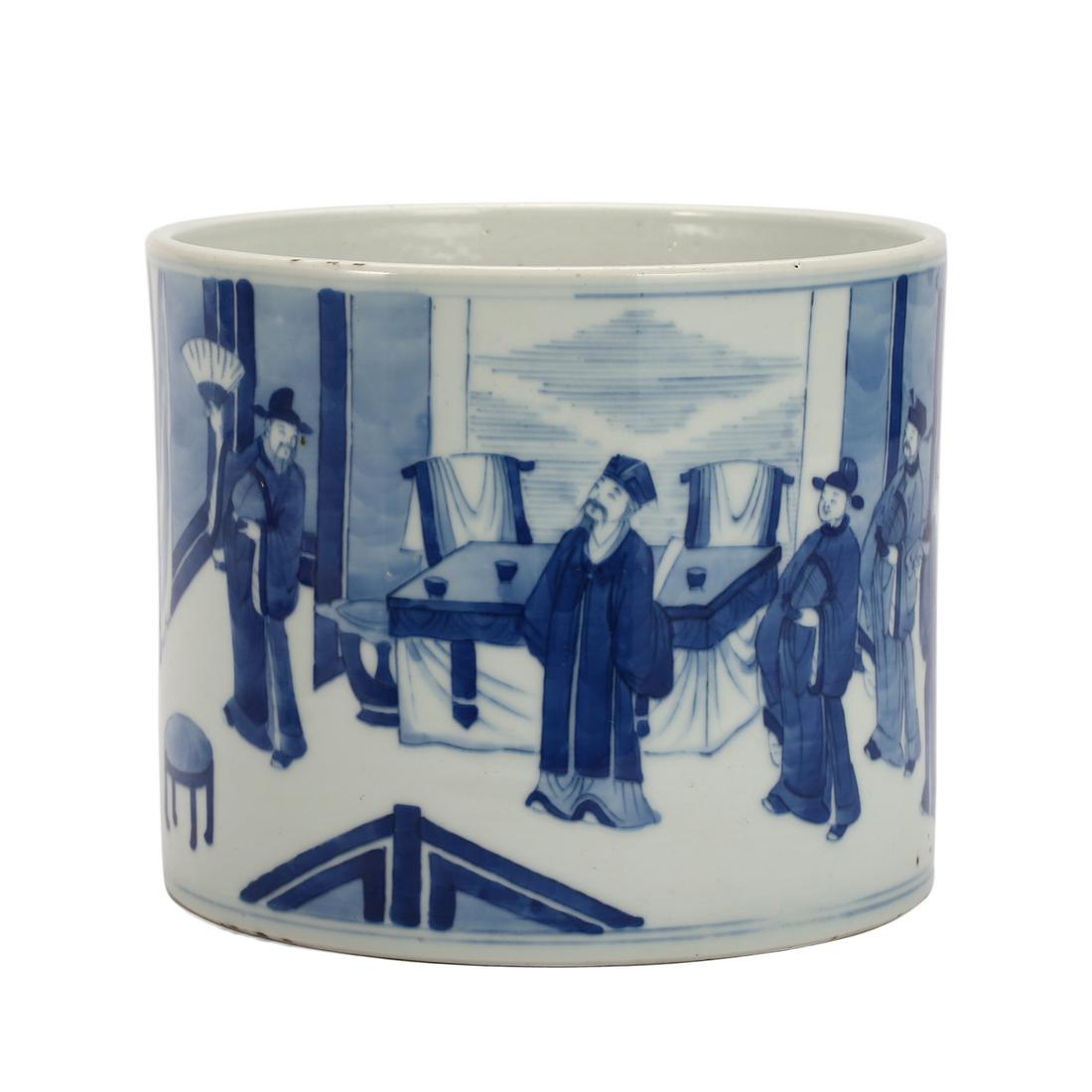 A BLUE AND WHITE 'FIGURES' BRUSHPOT (1 of 6)
