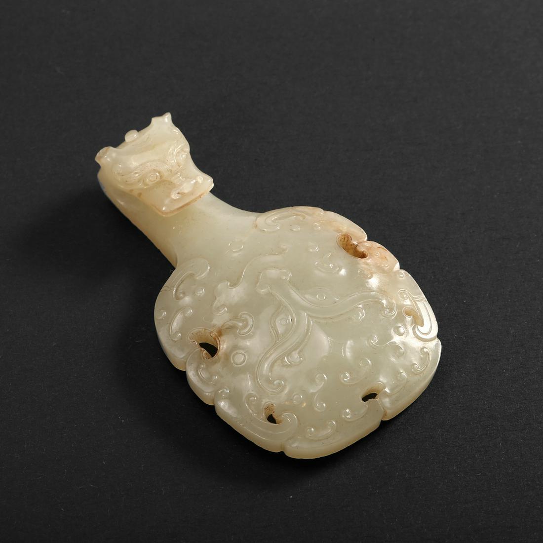 A WHITE JADE 'DRAGON' BELT HOOK (1 of 6)