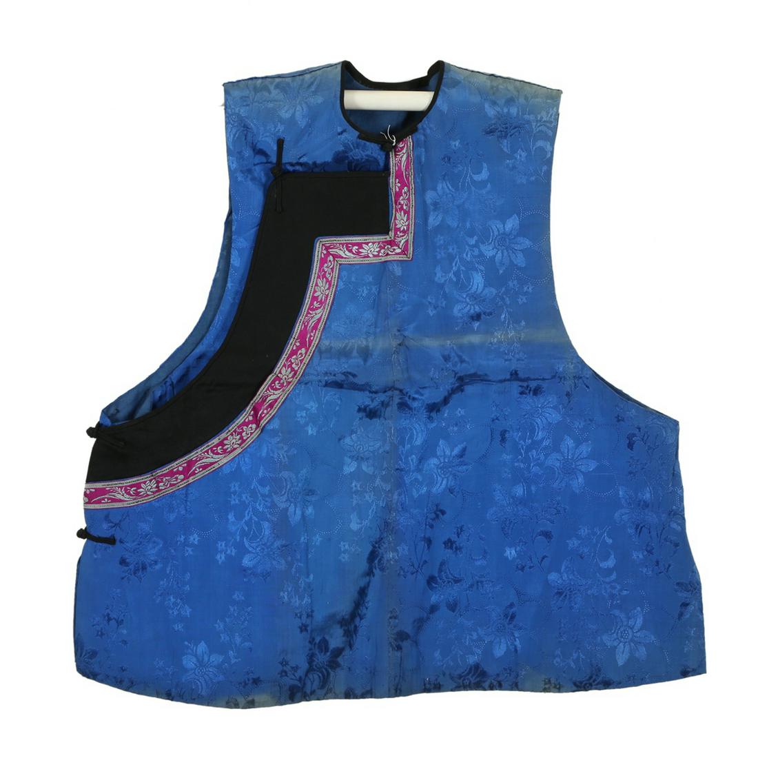 A BLUE-GROUND EMBROIDERED FLORAL WAISTCOAT: 32cm x 63cm