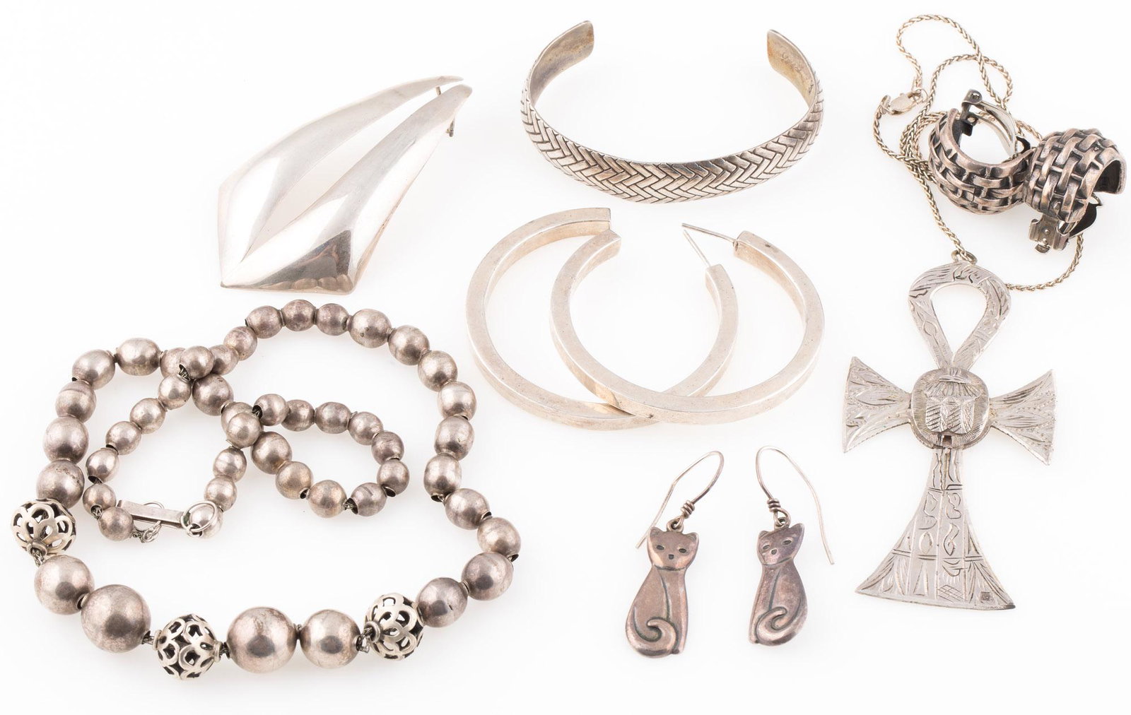 STERLING SILVER JEWELRY, .800 PURITY EGYPTIAN PENDANT: STERLING SILVER JEWELRY, .800 PURITY EGYPTIAN PENDANT "Sterling silver jewelry to include: Two pairs of pendant earrings Pair of hoop earrings, 51mm Pair of basket weave clip on earrings Bangle 