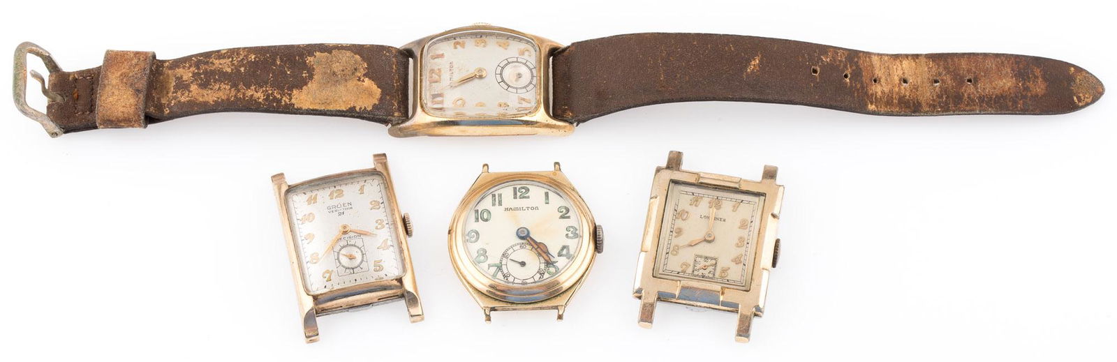 MENS GOLD FILLED WRISTWATCHES - HAMILTON GRUEN LONGINES: MENS GOLD FILLED WRISTWATCHES - HAMILTON GRUEN LONGINES Lot of four gold filled men's wristwatches, to include: a 14K gold filled Hamilton 987-F (not running), a Longines 10K gold filled 10L (running)