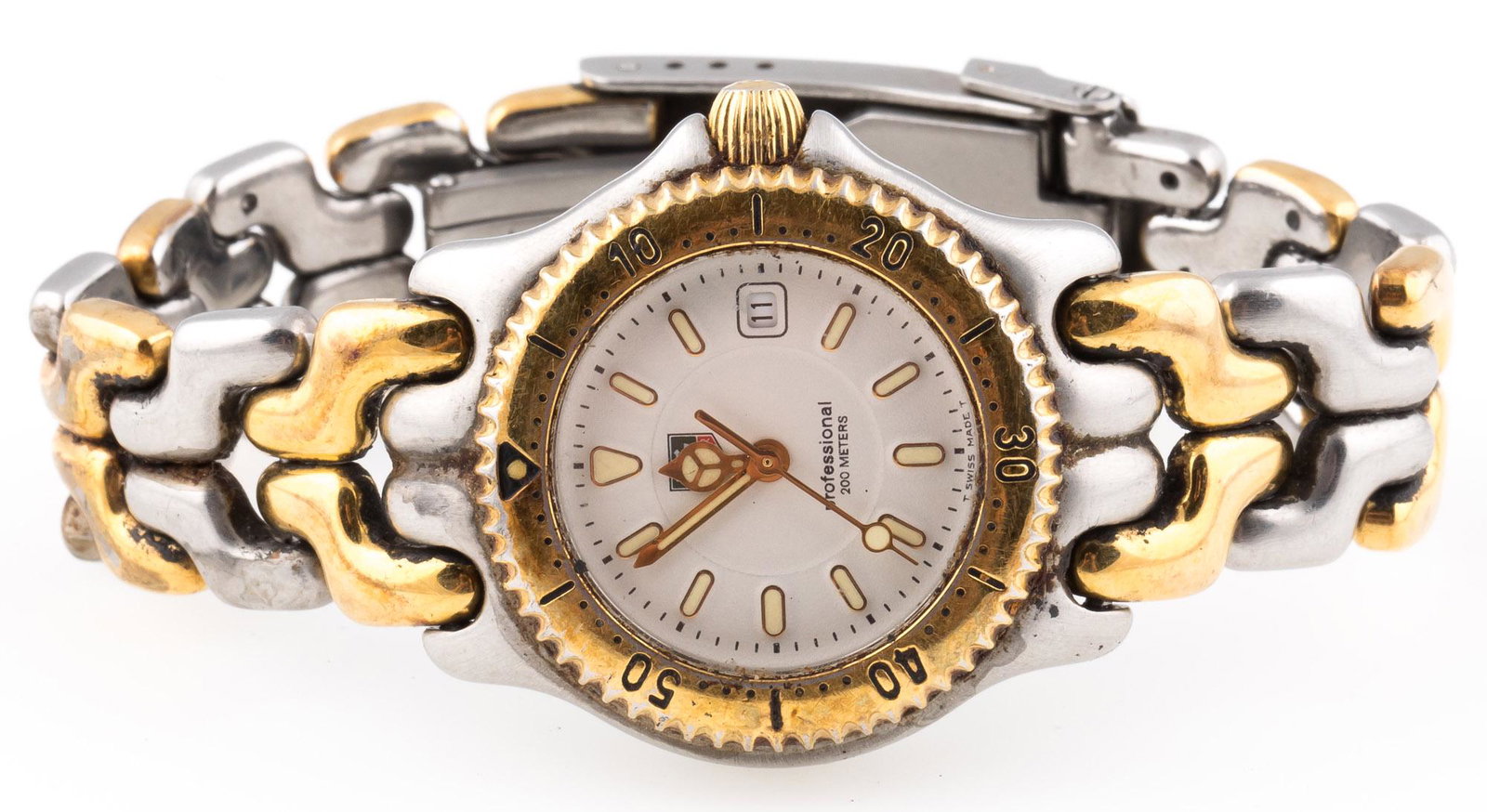LADIES TAG HEUER TWO TONE PROFESSIONAL 200 WRISTWATCH: LADIES TAG HEUER TWO TONE PROFESSIONAL 200 WRISTWATCH Ladies steel and yellow gold plated Tag Heuer wristwatch reference WG1322-RO. White dial with applied luminous indices, gold tone bezel. Serial RM