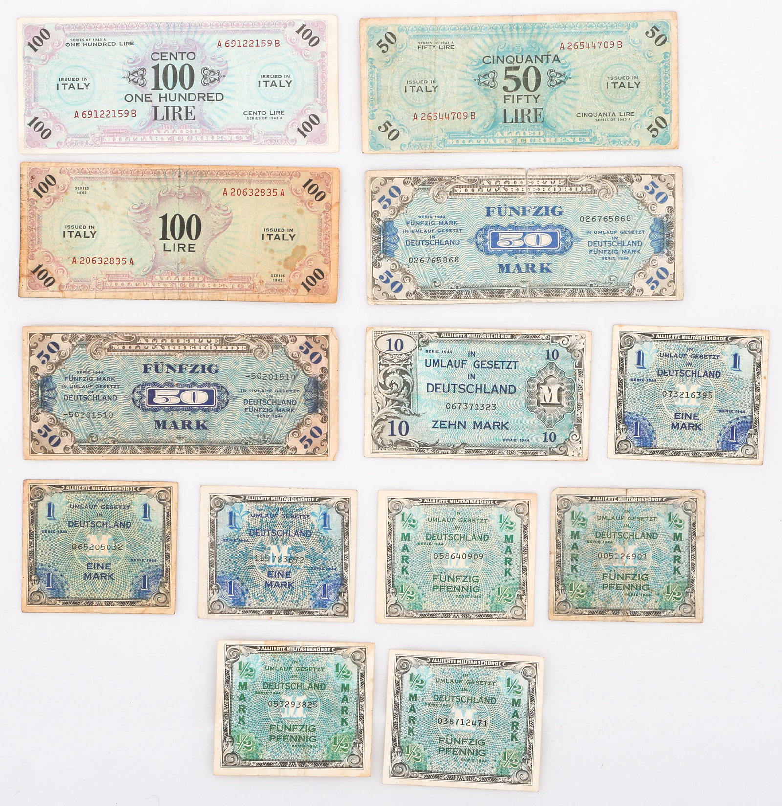 WWII WORLD CURRENCY - ITALY GERMANY: WWII WORLD CURRENCY - ITALY GERMANY Lot of 13 paper currency pieces from Italy and Germany from 1943 and 1944, varied denominations.