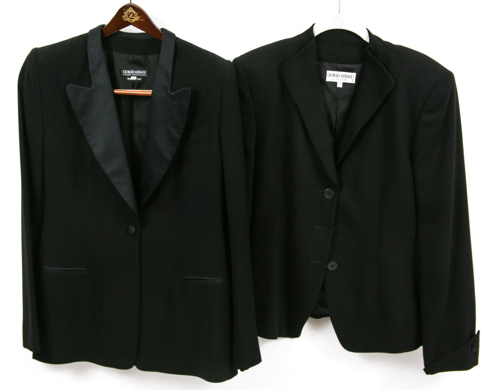 WOMEN'S GIORGIO ARMANI BLACK BLAZERS - LOT OF 2: WOMEN'S GIORGIO ARMANI BLACK BLAZERS - LOT OF 2 Two black women's Giorgio Armani blazers, includes: Size 10; three buttons down front; neck to hemline 25"; 18" shoulder to shoulder; 25" sleeve length;