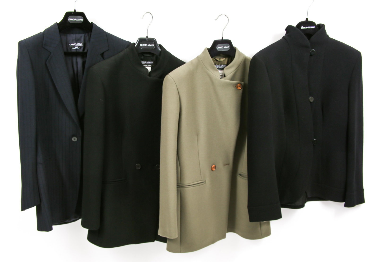 WOMEN'S GIORGIO ARMANI BLAZERS - LOT OF 4: WOMEN'S GIORGIO ARMANI BLAZERS - LOT OF 4 Giorgio Armani women's blazers; sizes and descriptions as follows: Black, 3 button blazer: High collar and no lapels, front darts on either side; very good co