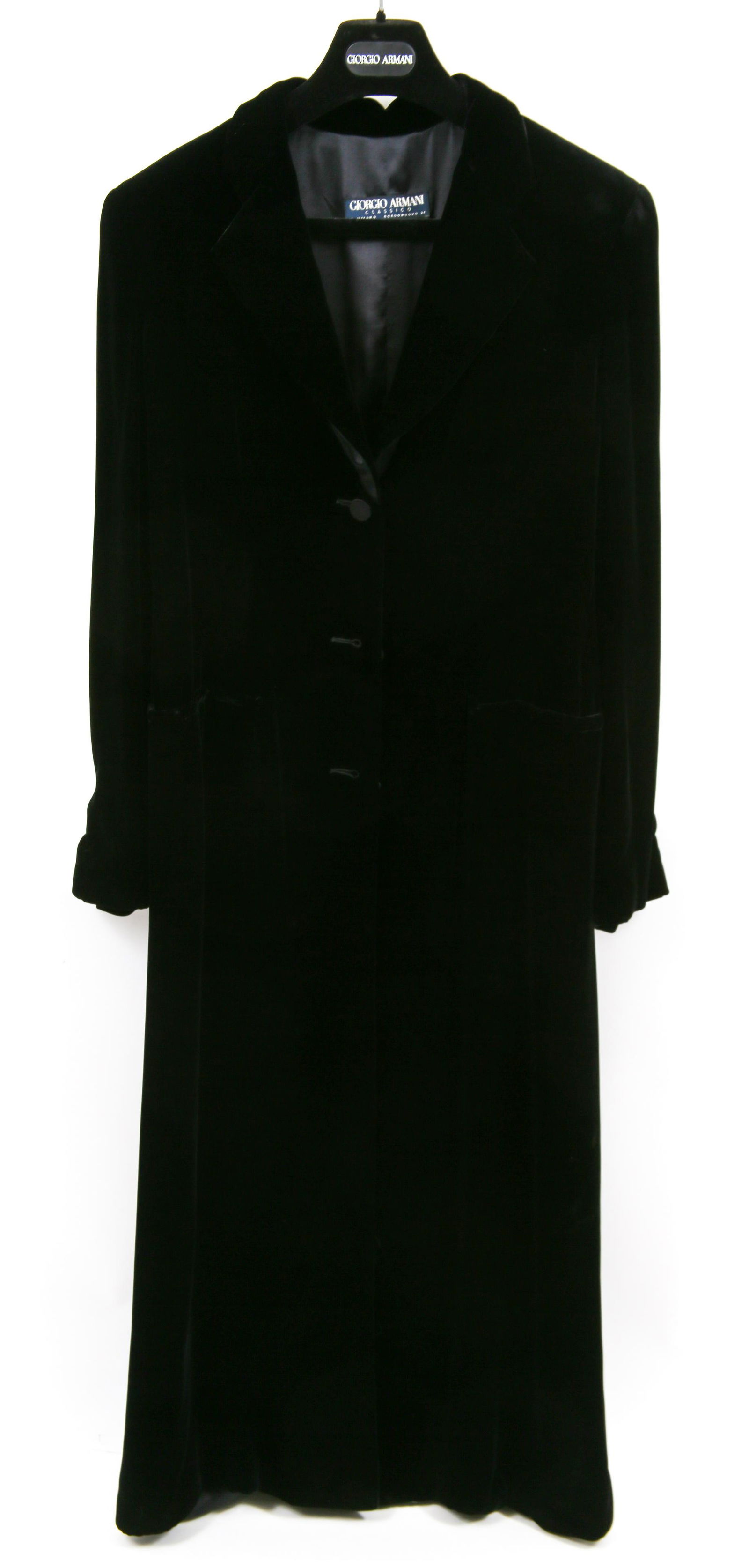 WOMEN'S GIORGIO ARMANI BLACK VELVET EVENING TRENCH COAT: WOMEN'S GIORGIO ARMANI BLACK VELVET EVENING TRENCH COAT Women's Giorgio Armani evening-style black trench coat: two stitched front pockets three-button cuffs Size 44 22" slit in back