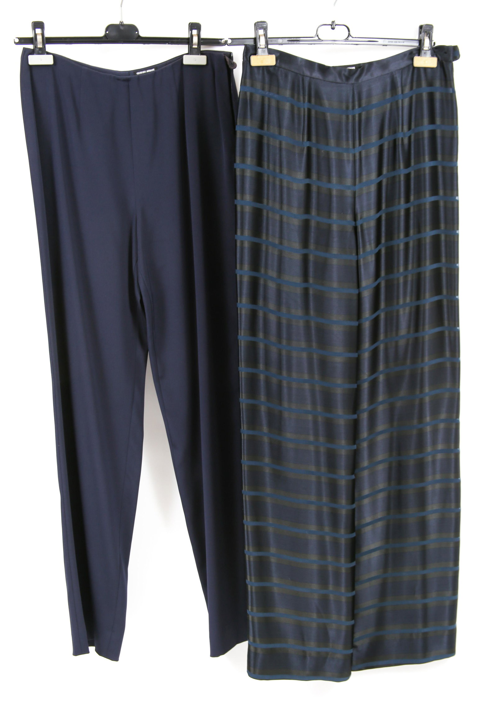 WOMEN'S GIORGIO ARMANI NAVY BLUE TROUSERS - LOT OF 2: WOMEN'S GIORGIO ARMANI NAVY BLUE TROUSERS - LOT OF 2 Women's Giorgio Armani navy blue trousers, includes: 28" waist, 43" from waistline to hemline, 32" inseam 70% rayon, 30% silk 28" wais