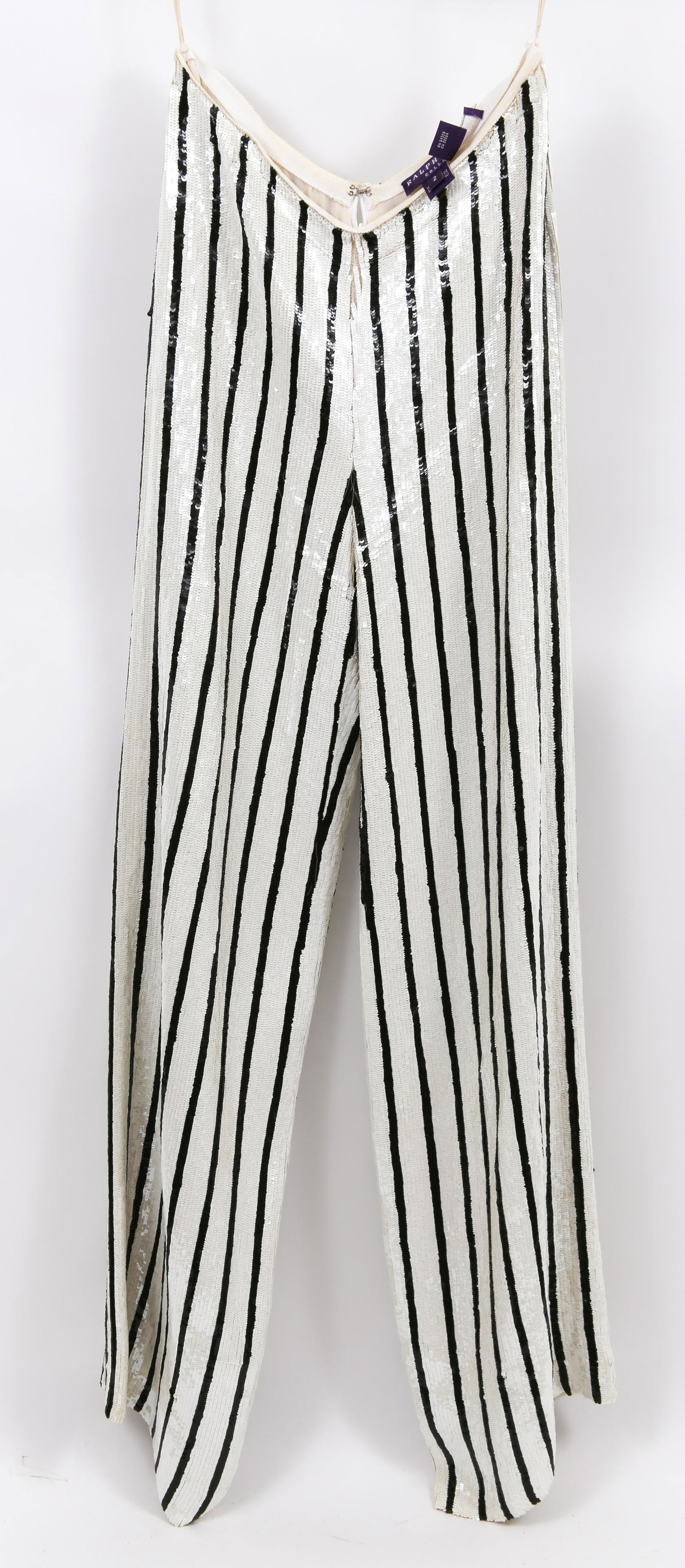 RALPH LAUREN BLACK & WHITE SEQUIN SILK PANTS: RALPH LAUREN BLACK & WHITE SEQUIN SILK PANTS Ralph Lauren Collection white and black stripe sequin pants, made in USA. 100% Silk. Size: 2
