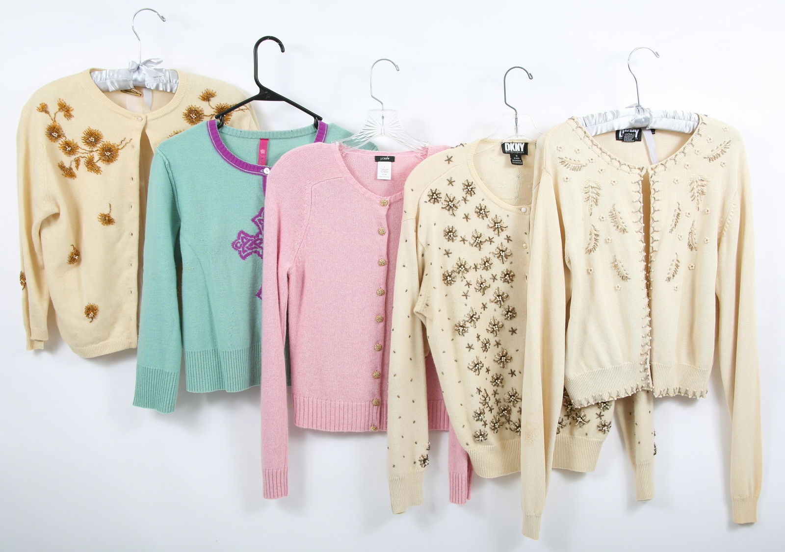 WOMEN'S CREAM & PASTEL COLORED CARDIGANS - LOT OF 5: WOMEN'S CREAM & PASTEL COLORED CARDIGANS - LOT OF 5 DKNY Lambswool cardigan, cream colored with imitation pearls and bronze beads throughout; good condition - some pilling and some missing beads on b