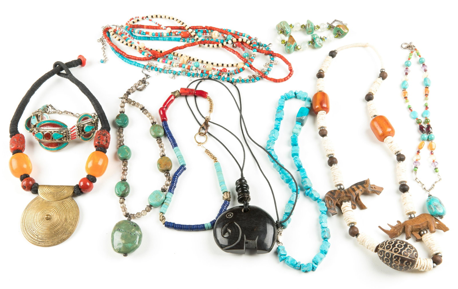 TRIBAL-INSPIRED BEADED JEWELRY - NECKLACES & BRACELETS: TRIBAL-INSPIRED BEADED JEWELRY - NECKLACES & BRACELETS Tribal-inspired beaded jewelry lot, including eight necklaces and two bracelets. Weight: 646g