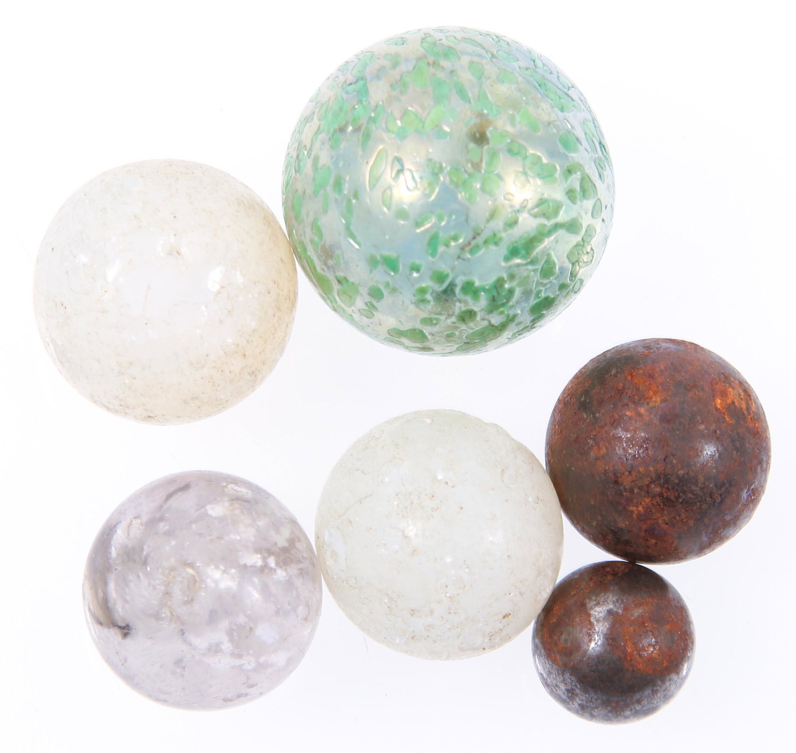 20TH C. MARBLES - MOONIES, STEELIES, ONIONSKIN: 20TH C. MARBLES - MOONIES, STEELIES, ONIONSKIN Lot of mixed 20th century marbles includes: 2 "moonies" 2 "steelies" 1 "onionskin" 1 "confetti" Size: 0.5" to 1"
