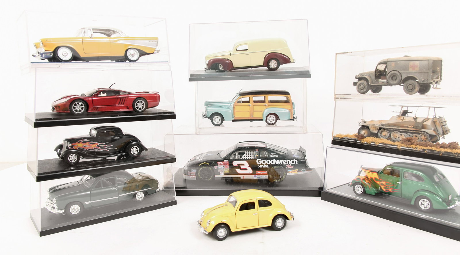 SCALE MODEL VEHICLES - LOT OF 11: SCALE MODEL VEHICLES - LOT OF 11 All models are already built and in separate display cases, no original boxes. Action 2001 Monte Carlo Goodwrench Plus #3 car; black; diecast; 1:18 scale 20th C. era D