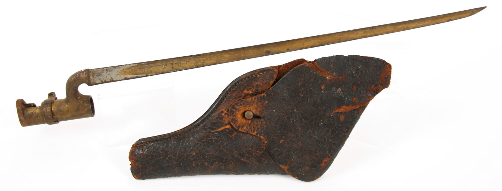 CIVIL WAR ERA SOCKET BAYONET & LEATHER HOLSTER: CIVIL WAR ERA SOCKET BAYONET & LEATHER HOLSTER Civil War era leather holster and socket bayonet, stamped "FIELD" on ricasso. Blade length: 18" Overall length: 21" Holster size: 11"